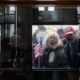 You've seen the photo of Ohio protesters. Here's the story behind it.