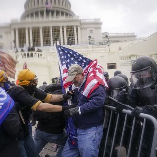 Dozens charged in Capitol riots spewed extremist rhetoric