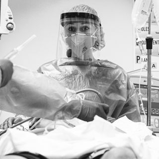 'The Essence Of Truth': A Doctor's Photos Document The COVID-19 Crisis In The ER