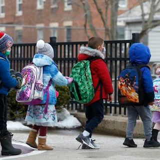 Baker administration calls for Mass. elementary students to be in school five days a week in April, with older students to follow - The Boston Globe