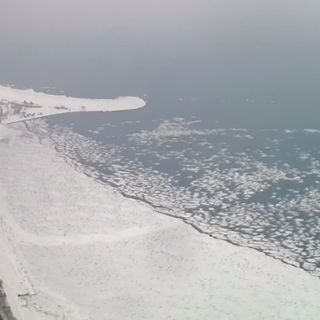 Video shows ice breaking away from Lake Michigan after deep freeze