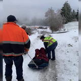 Video shows plow driver and crew using old sled to rescue COVID-19 patient trapped by snow