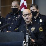 Dallas police officer charged with arranging two killings