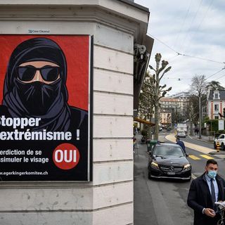 Switzerland narrowly votes to ban face covering in public