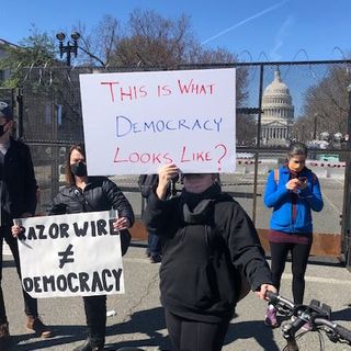 With lawn chairs, Scrabble and pizza, D.C. protesters say miles-long Capitol fencing keeps them from regular life