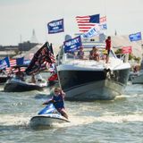 Sheriff who flew Trump flag on patrol boat violated ban on partisan political activity, officials say