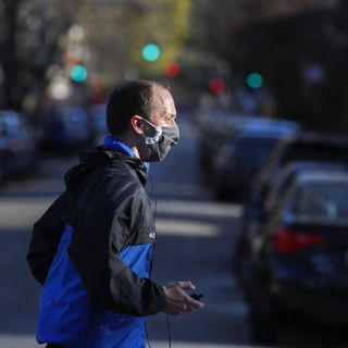 Pedestrians complain runners are passing too close on Chicago sidewalks during the pandemic. How risky is that, and should they wear face masks?