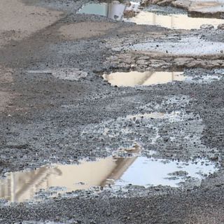 Drivers feel the pothole pains after wet weather