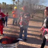 Protesters hold "mask burning rally" outside Maricopa County Public Health