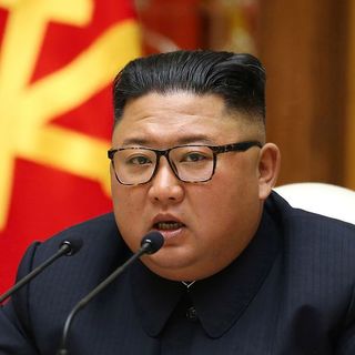 Kim Jong un 'in beach resort lockdown after people close to him catch Covid-19'