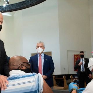 'We aren't at the finish line': Biden offers warning as he moves up timeline for vaccine eligibility