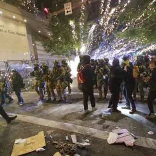 Man Threatens Police With Concrete Block During Minneapolis Rioting, Video Captures the Response