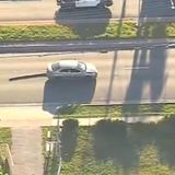 Perfect PIT Ends Police Chase of Suspected DUI Driver Dragging Spike Strip