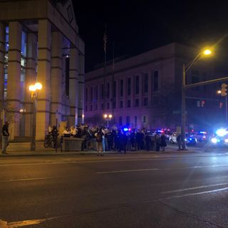 Officer injured when protestors attempt to break into Columbus police headquarters