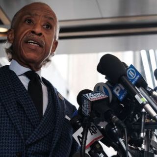 Al Sharpton Walks to Board Private Jet en Route to Derek Chauvin Trial