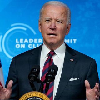 Biden announces US will aim to cut carbon emissions by as much as 52% by 2030 at virtual climate summit