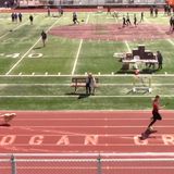 Dog runs on track during high school meet, beats runner to finish line