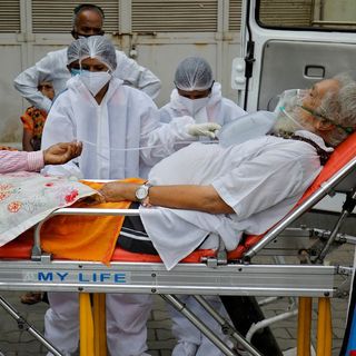 Vital medical supplies reach India as COVID deaths near 200,000