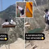 Two women fall off swing on edge of cliff when chain snaps - and SURVIVE