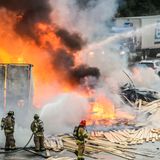 Trucks carrying lumber, candles burst into flames after collision on I-285