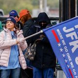 QAnon supporters gather in downtown Dallas expecting JFK Jr. to reappear