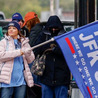 QAnon supporters gather in downtown Dallas expecting JFK Jr. to reappear