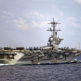 Sailors head back to aircraft carrier hit by virus outbreak