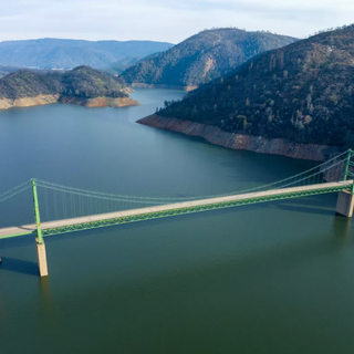 Before and after photos from space show storms' effect on California reservoirs