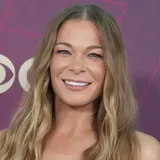 LeAnn Rimes dons a red biкini for a holiday announcement