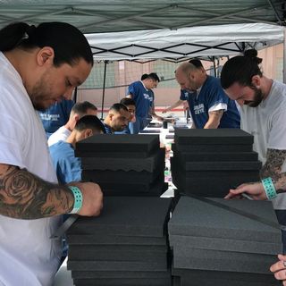 Inmates volunteer to make masks for first responders