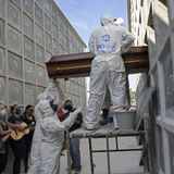 Virus surge in Brazil brings a coffin shortage, morgue chaos