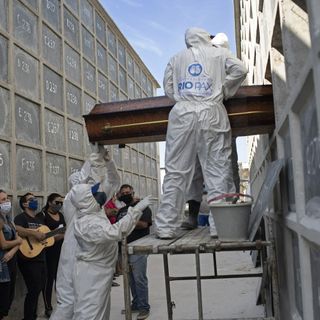 Virus surge in Brazil brings a coffin shortage, morgue chaos