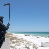 Laywer dressed as Grim Reaper haunting Florida beaches