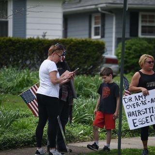 Small group protests Ohio coronavirus restrictions outside Health Department Director Dr. Amy Acton’s house