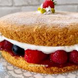 Vegan Victoria Sponge cake with berries and cream