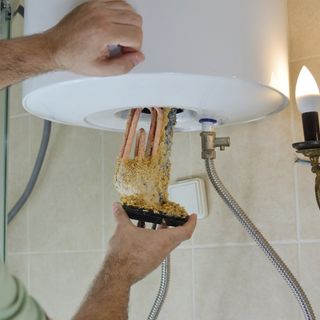 Hot Water Heater Calcium Removal [How to Guide] - Home Guide Corner