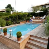 9 Ways To Blend An Above Ground Pool Into Your Backyard | howtogardendesign.com