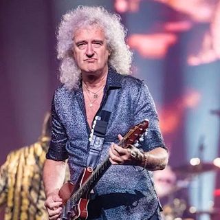 Queen's Brian May severely tears butt muscle in a "moment of over-enthusiastic gardening"