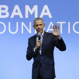 Obama lashes out at Trump in call with supporters