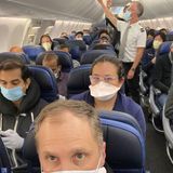 United Airlines said it would try to keep middle seats empty. This photo shows a nearly full flight