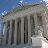 Under fire, US Supreme Court unveils ethics code for justices