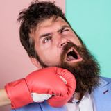 Did men's beards evolve to absorb a punch to the jaw?