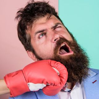 Did men's beards evolve to absorb a punch to the jaw?