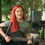 Local musician raises money from her porch for tornado victims