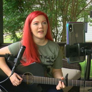 Local musician raises money from her porch for tornado victims