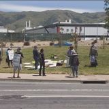 Frustrated protesters outside Fremont Tesla factory want to see CEO Musk put behind bars