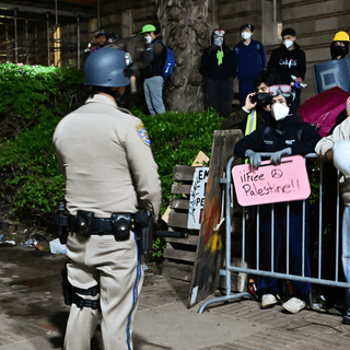 UCLA cancels classes after night of violence over pro-Palestinian encampment