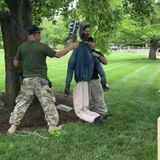 Gun rights protesters hang effigy of Kentucky Gov. Andy Beshear outside state capitol