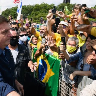 Brazilian President called "killer" and "trash" by angry crowd in capital