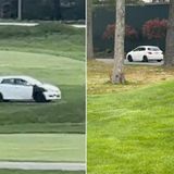 Vandal drives car onto golf course, nearly hits players and damages greens